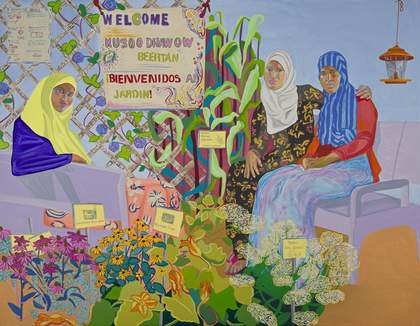 Aliza Nisenbaum Nimo, Sumiya, and Bisharo harvesting flowers and vegetables at Hope Community Garden 2017