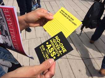 a person holds leaflets