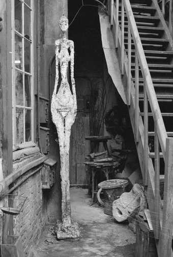 Stairs with "Femme debout", entrance of the studio, ca. 1962