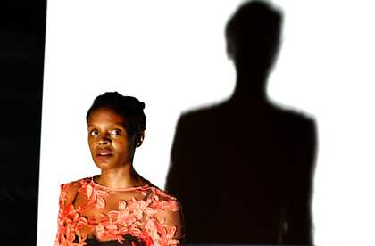 portrait of the artist with large shadow behind