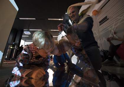 A photograph of a child playing at 