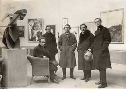 Organisers of the First Russian Art Exhibition, Berlin. the foreground is the lost iron version of Gabo’s Constructed Torso 1917.