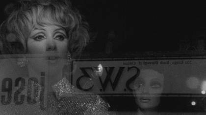 The Otolith Group still from Otolith III 2009 still depciting a woman and a mannequin through a window