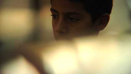 The Otolith Group still from Otolith III 2009 still depicting a boys face