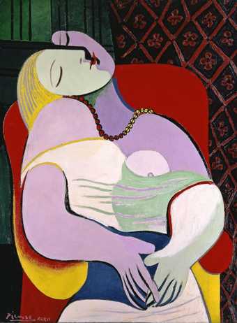 Pablo Picasso's painting The Dream (Le Rêve) 1932 of a blonde woman resting in a red armchair