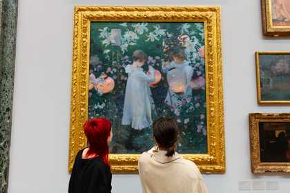 Image of people looking at art in Tate Britain