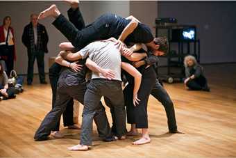 Performance 2 Re-enactment of Simone Fortis Huddle at MoMA New York 2009