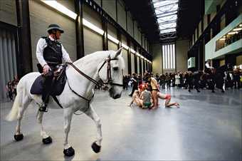 Performance of Tania Brugueras Tatlins Whisper 5 in the Turbine Hall at Tate Modern 2008