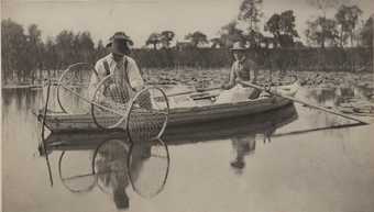 Black and white image of a painting of two people on a boat on a lake