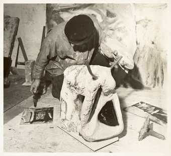 Peter Lanyon working on a sculpture of a bull in his studio Little Parc Owles Cornwall circa 1958