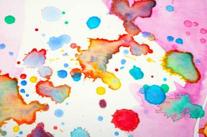 splatters of multicoloured paint on a white background