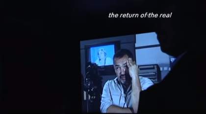 film still from interview with Phil Collins