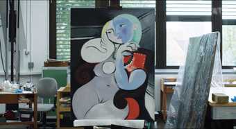 A still of Picasso's painting Nude Woman in a Red Armchair