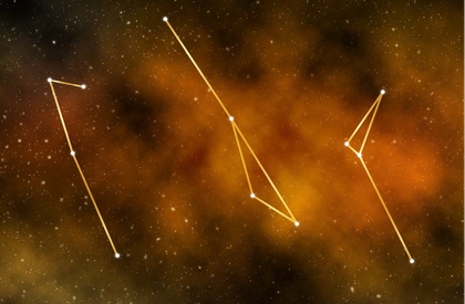 an image of constellations in an orangy-black background
