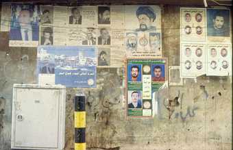Martyr and political posters on a wall in the Bashoura area of Beirut 1997