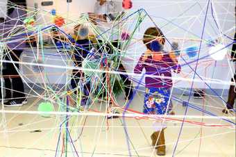 Kid in a string installation