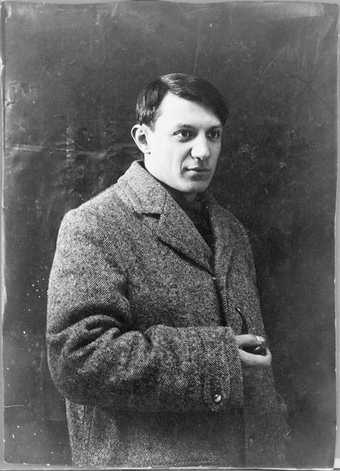 Black and white photograph of Pablo Picasso as a young man