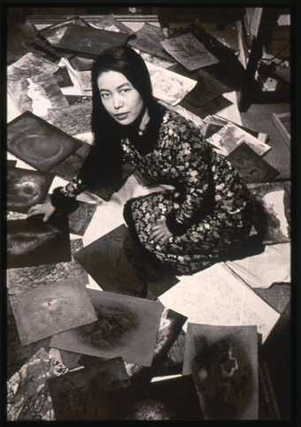 Portrait of Yayoi Kusama in her room in her parents’ home in Matsumoto, c.1957 Courtesy Yayoi Kusama Studio, Inc