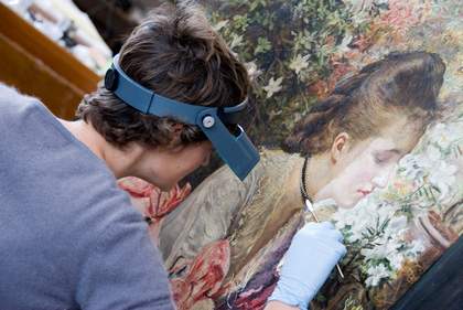 A Tate conservator at work