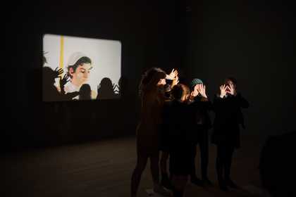 A group of children with a projector