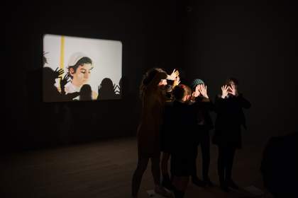 A group of children with a projector