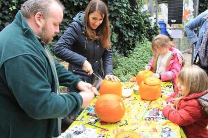 Photograph of a pumpkin carving workshop
