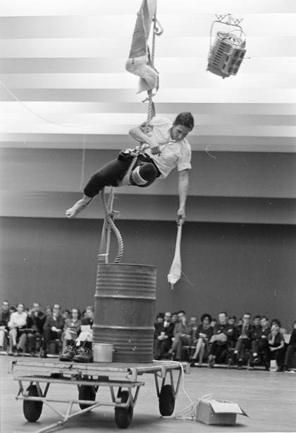 Rauschenberg performing 'Elgin Tie' during 'Five New York Evenings' at Moderna Museet, Stockholm, 13 September 1964, photographed by Stig T Karlsson