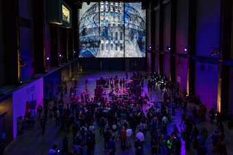 A group of people dancing in the Turbine Hall