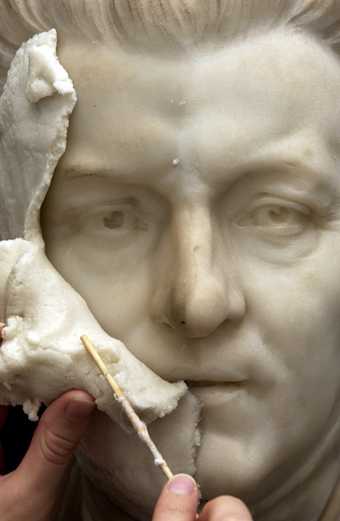 Poultice removal on Reynolds sculpture by Foley