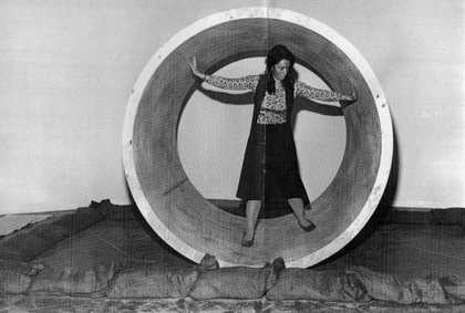 A member of Tate staff navigating the Robert Morris exhibition, 1971
