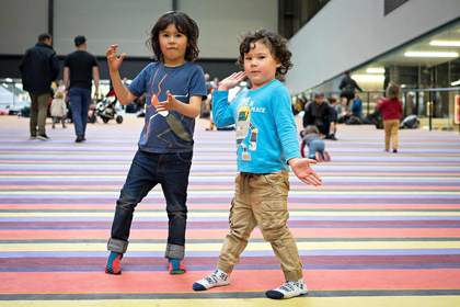 two boys doing robot moves