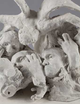 Auguste Rodin Assemblage of reduced heads of Jean d’Aire and Jean de Fiennes and hands, topped by a winged figure