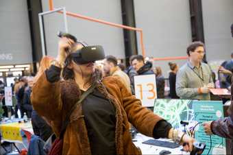 A person trying on a virtual reality headset