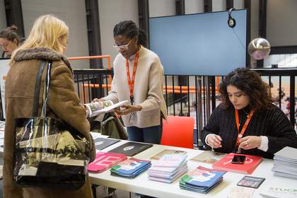 a person speaking to Tate staff