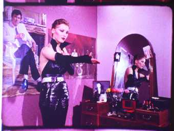 Still from John McManus's film Roxette, showing a group of Manchester art school students getting ready for a glam-inspired night out.