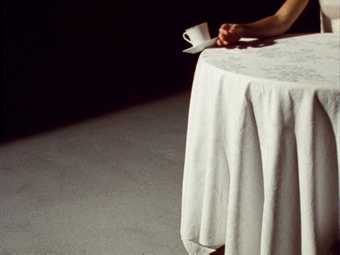 Runa Islam Be The First To see What You see As You see It 2004 photograph of a tea cup and saucer being knocked off a table