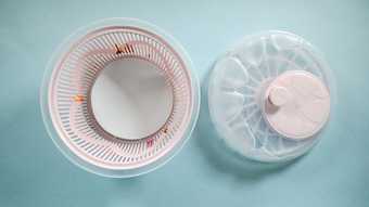 Photo of paper plate inside a salad spinner