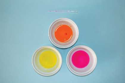 Photo of diluted poster paint and pipette
