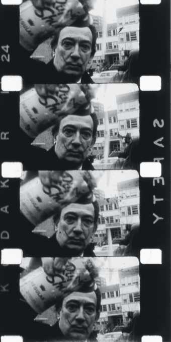 Film stills of Salvador Dalí spraying foam in a happening filmed by Peter Beard 1964