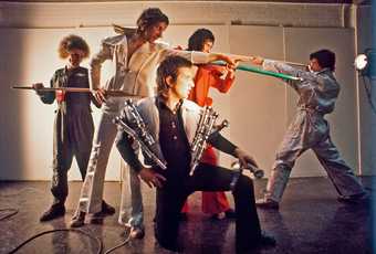 Bruce McLean and Paul Richards, Nice Styles: Glam Rock Performance 1974, Colour photograph