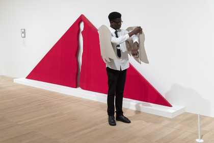 Student in front of an artwork