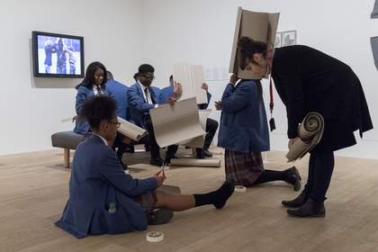 children collaborating using cardboard in the gallery