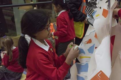 Photograph of young student taking part in a school workshop at tate modern