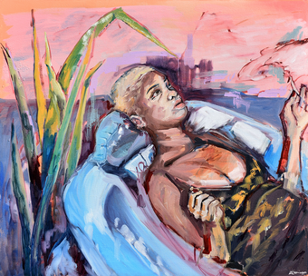 woman lying in water and reeds