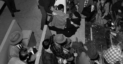 Ariel black and white photograph of people standing