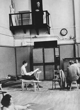 William Coldstream observing the life room from the balcony of his office at the Slade Published in John Russell, Bryan Robertson, Lord Snowdon, Private View: The Lively World of British Art, 1965