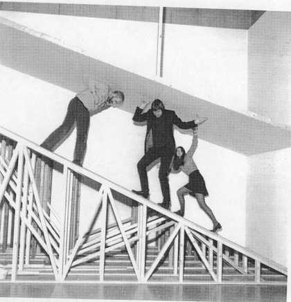 Tate staff navigating the Robert Morris exhibition 1971 