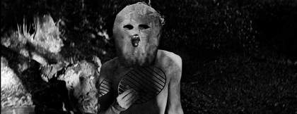 a man in a mask in black and white