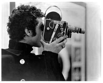 Warren Sonbert with his film camera