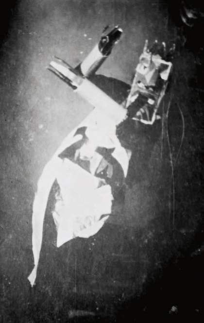 Sophie Taeuber-Arp performing to the sound poem by Hugo Ball in costume and mask probably by Jean (Hans) Arp on the occasion of the opening of the Galerie Dada, Zurich, March 1917 Stiftung Arp e.V., Berlin